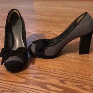 Black & white 1/2 in platform, 3 1/2 in heel.